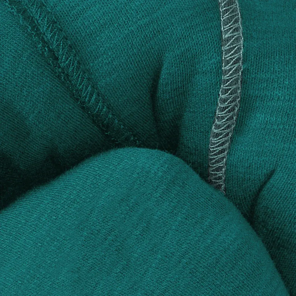 Detailaufnahme Stoff und Naht des manduca Sling Babytragetuchs in Teal